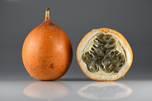Sweet granadilla: Sweet granadillas ( Passiflora ligularis ) – single and cross section